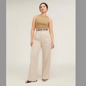 Up for sale is this beautiful sleeveless top from Everlane. New condition with t